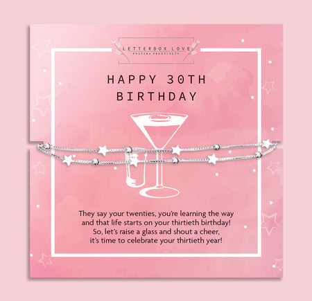A 'Happy 30th Birthday' bracelet with silver star charms, displayed on a card with a celebratory message, symbolizing the joy and milestone of turning thirty.