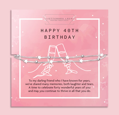 Letterbox Love 40th birthday jewellery gift – delicate silver star bracelet with beads, presented on a pink sentimental card featuring a key illustration. A meaningful 40th birthday present for daughter, granddaughter, sister or best friend. Perfect affordable keepsake gift.