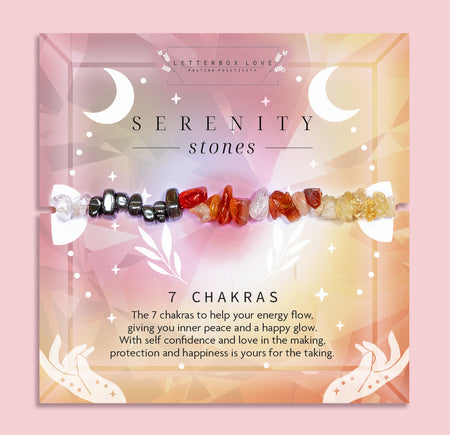 7 chakra crystal chip bracelet on pastel pink and orange display card by Letterbox Love. Handmade healing crystal bracelet for energy balance, inner peace, and positivity. Features seven natural gemstone chips aligned with the chakras. Spiritual gift for her, mindfulness jewellery, and wellness bracelet for self-love and protection