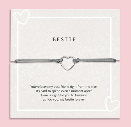 Bracelet with heart charm on a 'Letterbox Love' card with text on a pink background. A meaningful sentiment for a friend. A gift under £10 for a best friend