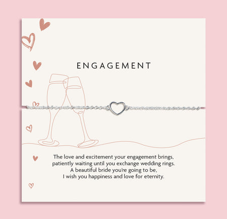 Letterbox Love poem card with brown celebration illustrations and a meaningful poem. Around the card is a silver-plated hollow heart bracelet, an elegant gift for an engagement