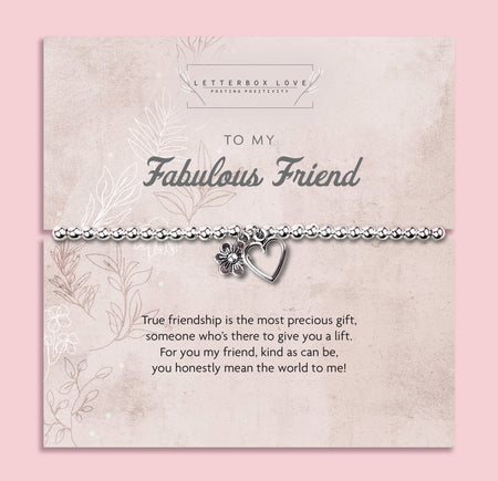 Silver beaded bracelet with heart and flower charms, displayed in a white gift box alongside a card titled