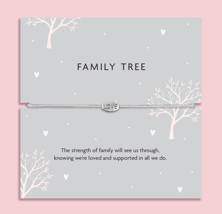 Grey adjustable cord bracelet with a small silver LOVE charm, presented on a card reading “Family Tree” with a message about the strength and support of family — a meaningful family-themed gift.