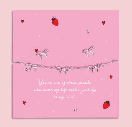 Silver-plated bow bracelet and earrings set, presented in a gift box with a heartfelt sentiment card that celebrates friendship and appreciation.