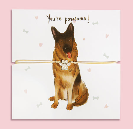 Paw print bracelet gift on illustrated card featuring a cute German Shepherd and 'You're pawsome!' message – perfect jewellery gift for dog mums and German Shepherd lovers.