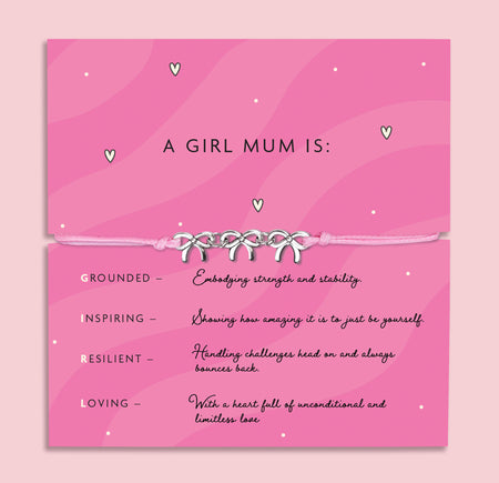 Pink adjustable cord bracelet with four silver bow charms, presented on a card reading “A Girl Mum Is” with messages about strength, inspiration, resilience, and love — a meaningful gift for mums of girls.