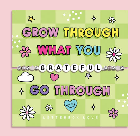 Green chequered poem card with the bold text saying