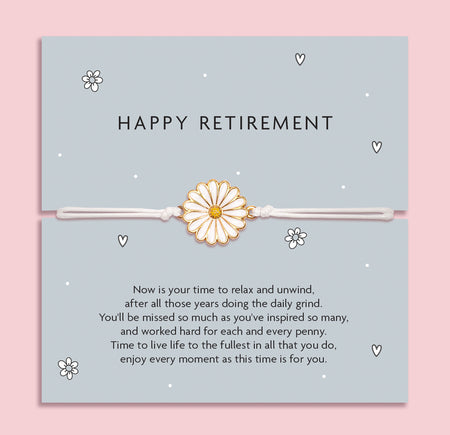 Happy Retirement Daisy Bracelet with a delicate daisy charm on an adjustable white cord, set on a blue card with a heartfelt retirement message. An ideal gift for a retiring friend or family member.
