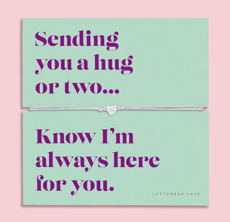 A teal-colored bracelet card titled