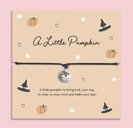Adorable Halloween pumpkin charm bracelet with adjustable black cord. Perfect spooky-season gift, trick-or-treat surprise, or autumn jewellery for her or kids.