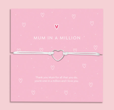 Mum in a Million bracelet with a silver heart charm on a white cord, presented on a pink card with the message 'Thank you Mum for all that you do, you're one in a million and I love you.