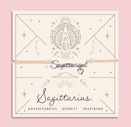 Meaningful Sagittarius bracelet with zodiac design on a pink background. A cute friendship bracelet for Sagittarius star sign.