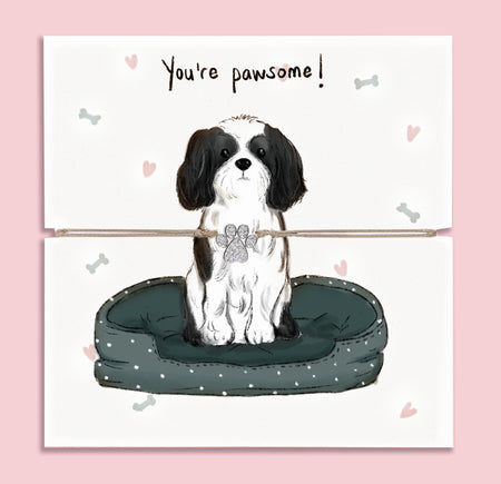 Cute paw print bracelet gift displayed on illustrated card with Shih-tzu dog and 'You're pawsome!' message – perfect for dog lovers and animal-themed jewellery gifts.