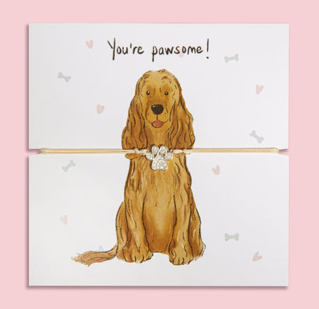 Paw print bracelet gift on illustrated card featuring a cute Cocker Spaniel and 'You're pawsome!' message – perfect jewellery gift for dog mums and Cocker Spaniel lovers.