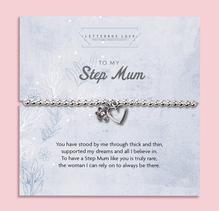 Silver beaded bracelet with a flower and heart charm, presented on a blue floral card with a heartfelt sentiment for a step mum.