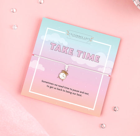 A pastel-colored bracelet card titled