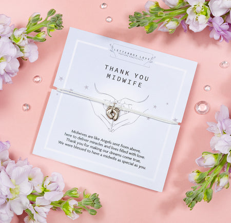 Thank you Midwife bracelet featuring a baby footprint charm on a white adjustable cord, presented on a card with a heartfelt message of appreciation for midwives.