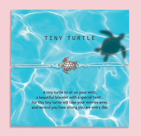 A turquoise bracelet with a small silver turtle charm, displayed on a card with a water-themed background. The card reads: 'Tiny Turtle. A tiny turtle to sit on your wrist, a beautiful bracelet with a special twist... For this tiny turtle will take your worries away and remind you how strong you are every day.' At the top, the brand name 'Letterbox Love' is shown with the tagline 'Posting Positivity