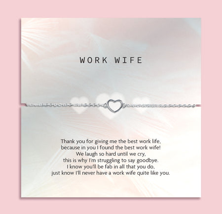 A grey poem card as a leaving gift for a colleague. The silver-plated heart bracelet in dainty around the poem card making a beautiful leaving gift for her