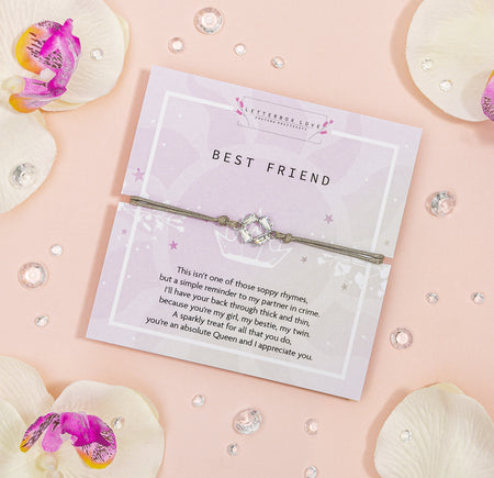 BEST FRIEND' bracelet with a shimmering charm, presented on a lilac card adorned with stars and a touching poem.