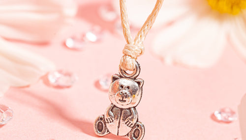 Cute bear charm on a string bracelet. First Mothers Day gift idea.