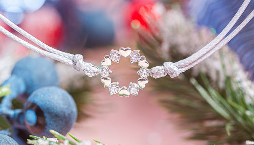 Cubic Zirconia wreath bracelet with a festive background