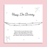 Silver plated double-layer star bracelet with silver bead detailing displayed on a Happy 13th Birthday sentiment card featuring a poem for a new teenager, meaningful milestone birthday gift for girls.