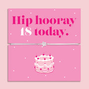 18th birthday bracelet with sparkling zircon heart charm on an adjustable cord, displayed on a pink “Hip Hooray, 18 Today” message card with illustrated birthday cake.
