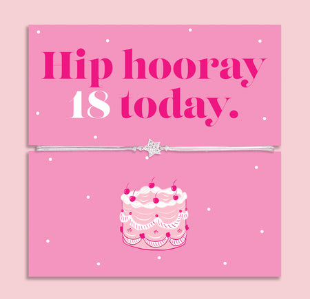 18th birthday bracelet with sparkling zircon heart charm on an adjustable cord, displayed on a pink “Hip Hooray, 18 Today” message card with illustrated birthday cake.