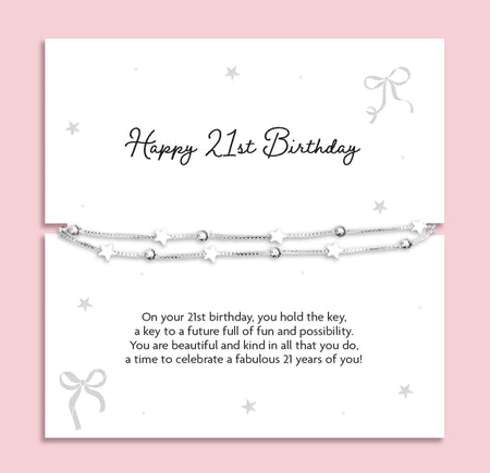 Silver plated double layer star bracelet displayed on a Happy 21st Birthday sentiment card featuring a meaningful birthday poem, presented as a keepsake birthday gift for her with pink gift pouch and optional gift box or Hugsy upgrade.