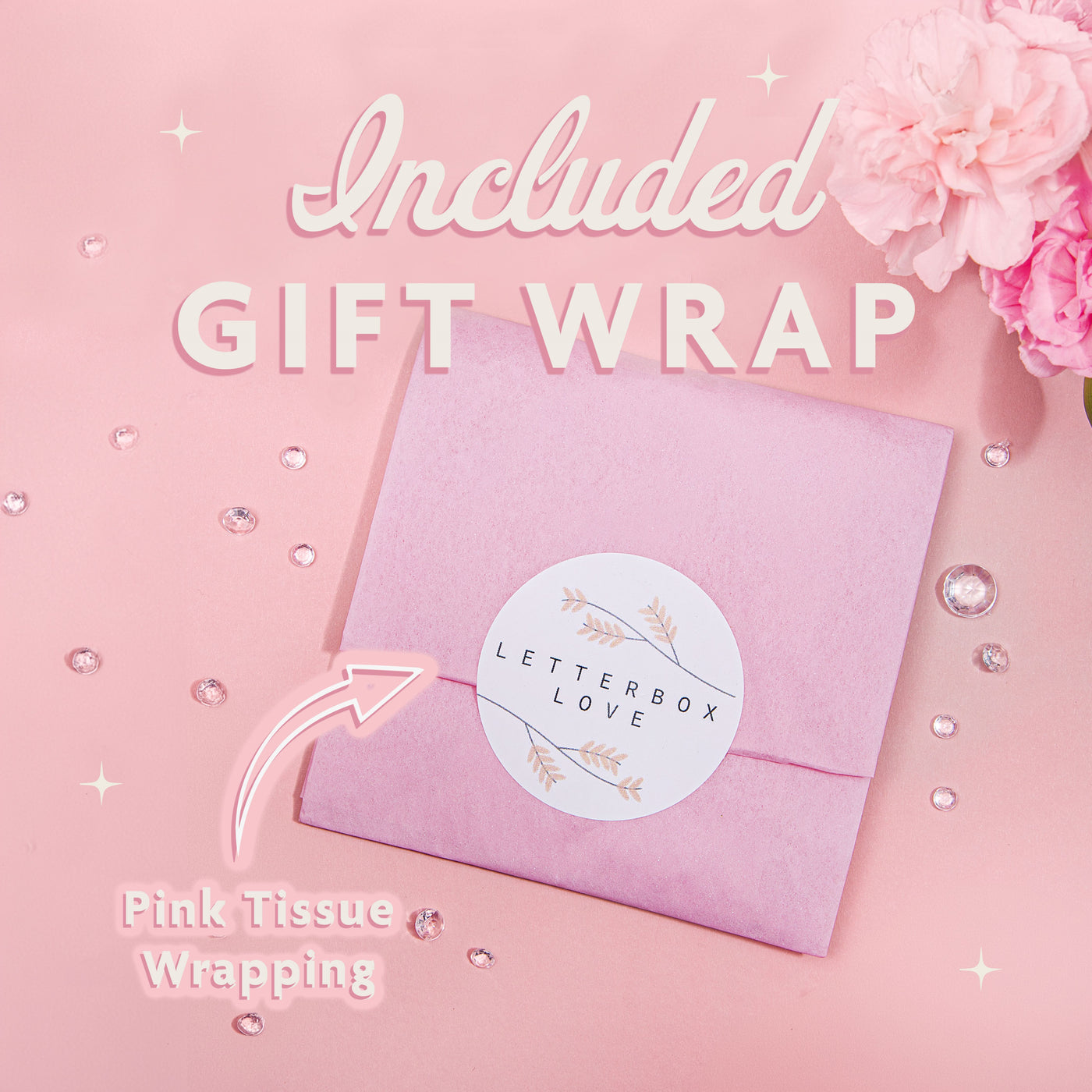 a pink tissue wrapped gift box with pink flowers