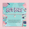 80s baby silver beaded bracelet with star charm displayed on retro 80s themed birthday card with Care Bears and arcade design, nostalgic birthday gift