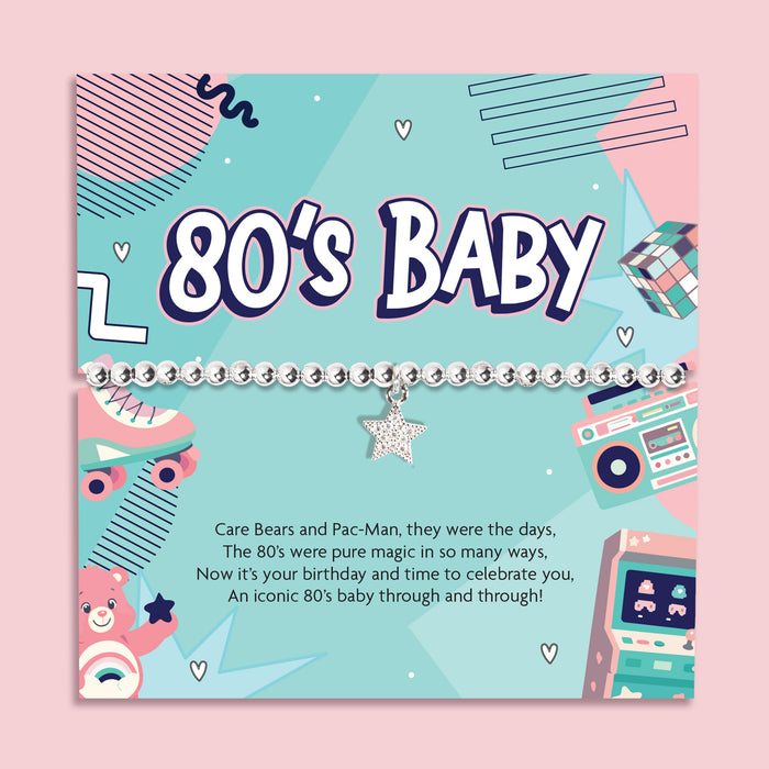 80s baby silver beaded bracelet with star charm displayed on retro 80s themed birthday card with Care Bears and arcade design, nostalgic birthday gift