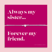 Pink sister friendship bracelet card featuring a cubic zirconia heart charm bracelet with the quote “Always my sister, forever my friend.” Meaningful sister gift and best friend keepsake jewellery.