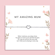 Delicate silver chain bracelet with open heart charm displayed on a “My Amazing Mum” poem card with soft floral illustrations, designed as a sentimental gift for mum