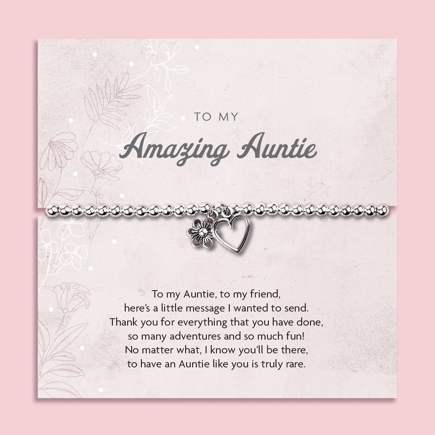 Silver beaded bracelet with heart and flower charms, displayed in a white gift box alongside a card titled 