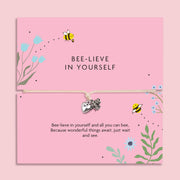 Bee-lieve in yourself adjustable cord bracelet with silver bee and heart charms on pink floral motivational gift card