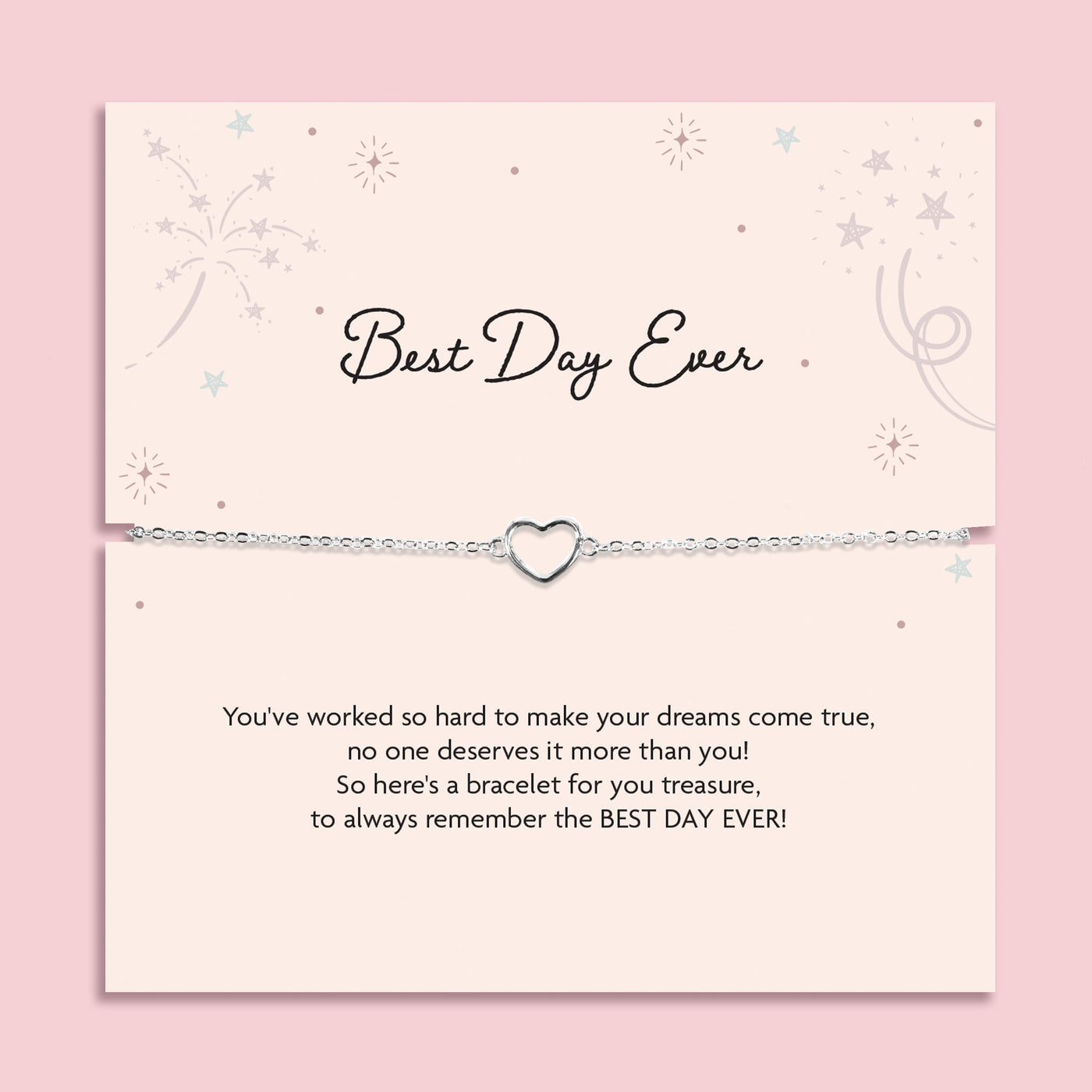 Silver heart charm bracelet displayed on a blush pink “Best Day Ever” poem card with delicate star illustrations. A sentimental silver bracelet gift for graduation, weddings, or milestone celebrations.