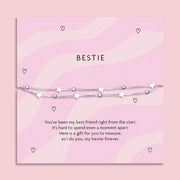 Silver-plated star bracelet on a pink wavy poem card with a meaningful sentiment for a friend. Making a perfect gift for a best friend.