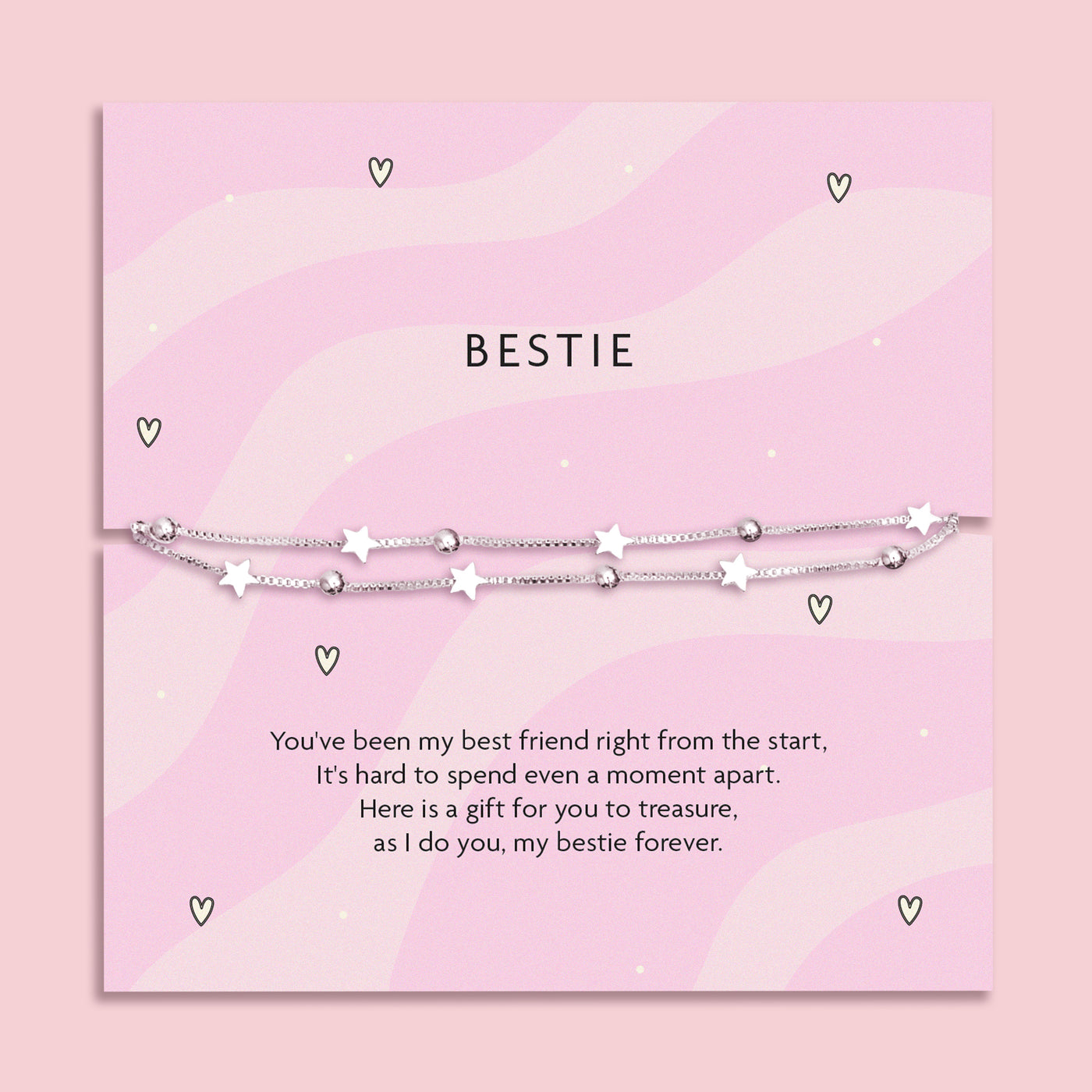 Silver-plated star bracelet on a pink wavy poem card with a meaningful sentiment for a friend. Making a perfect gift for a best friend.