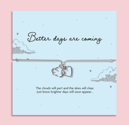 Grey adjustable cord bracelet featuring silver plated cloud and heart charms on a keepsake card reading 