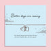 Grey adjustable cord bracelet featuring silver plated cloud and heart charms on a keepsake card reading 