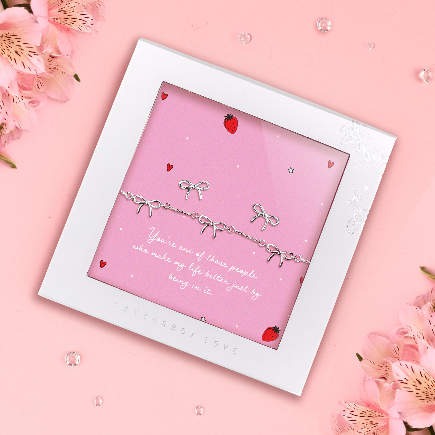 Silver-plated bow bracelet and earrings set, presented in a gift box with a heartfelt sentiment card that celebrates friendship and appreciation.