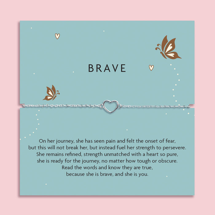 Silver plated hollow heart Brave bracelet displayed on a blue sentiment card with butterfly illustrations and an inspirational poem about strength and courage.