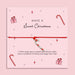 Pink Christmas card with festive illustrations and adjustable bracelet featuring a silver candy cane charm, gift idea for Secret Santa or stocking filler.