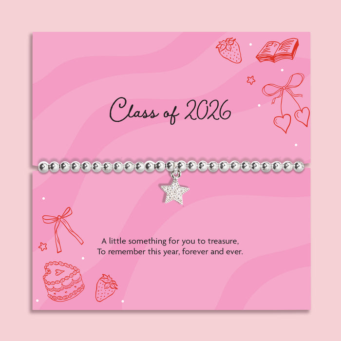 Silver plated beaded elasticated bracelet with cubic zirconia star charm displayed on a pink “Class of 2026” graduation message card, graduation keepsake jewellery gift.
