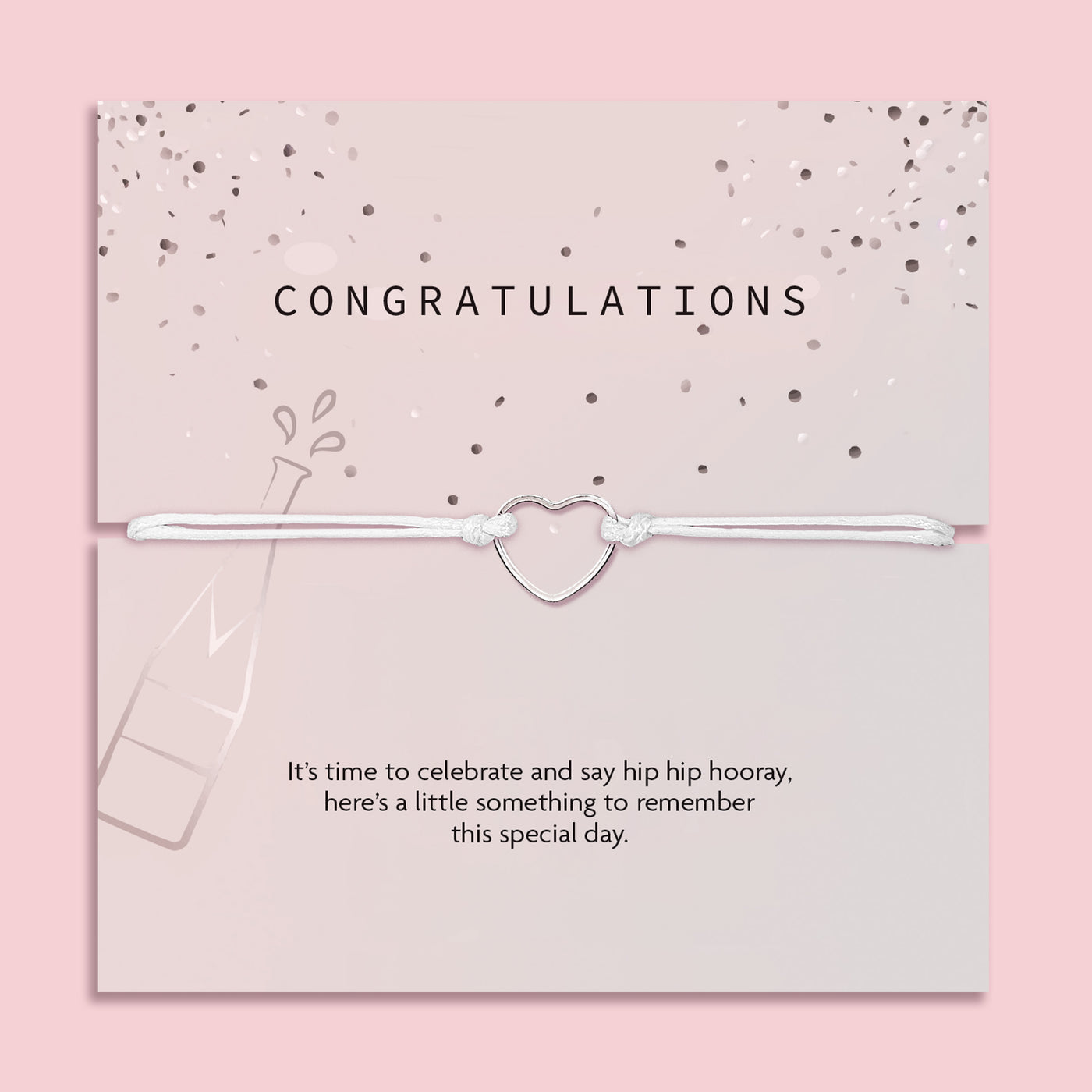 Letterbox Love 'Congratulations' bracelet – delicate silver heart charm on a white cord, presented on a pink confetti card with a champagne bottle design and celebratory message. A thoughtful letterbox gift for graduation, new job, engagement or promotion. Affordable jewellery gift to mark a special milestone for her.