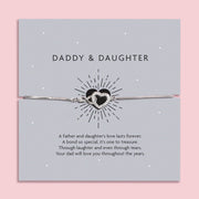 Silver infinity heart bracelet on a grey card with the words "Daddy & Daughter," featuring a heartfelt poem celebrating a father's love for his daughter.
