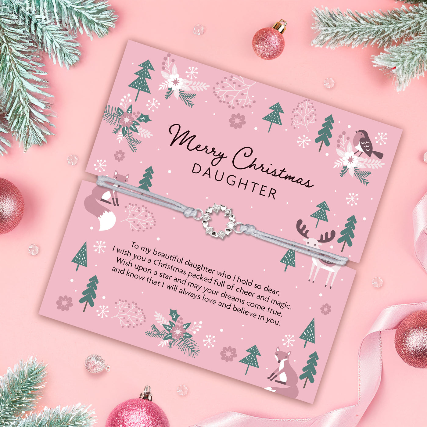 Christmas poem card for a daughter with decorative elements on a pink background. The bracelet is a cubic zirconia wreath, elegant gift for a daughter from Mum