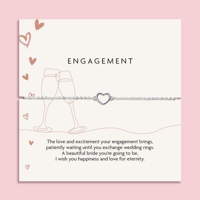 Letterbox Love poem card with brown celebration illustrations and a meaningful poem. Around the card is a silver-plated hollow heart bracelet, an elegant gift for an engagement